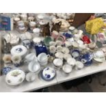 A LARGE COLLECTION OF MIXED CERAMICS TO INCLUDE CUPS AND SAUCERS ETC
