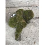 A STONE 'SLEEPING PIXIE' GARDEN ORNAMENT 20CM HIGH 40CM LONG