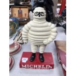 A CAST IRON MICHELIN MAN MODEL