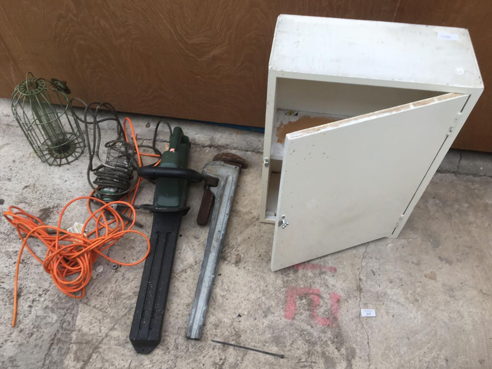 A SMALL WOODEN CABINET, A BLACK AND DECKER GTC300 HEDGE CUTTER, AN INSPECTION LAMP ETC
