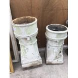 TWO CHIMNEY POTS ONE 83CM HIGH AND ONE 67CM HIGH