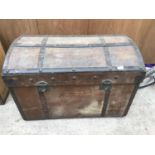 A VINTAGE WOODEN TRUNK WITH METAL STRAPPING (HANDLES A/F)