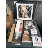 A COLLECTION OF MARILYN MONROE DVDS, BOOKS AND PICTURES