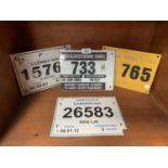 FOUR ASSORTED TAXI CAB NUMBERS