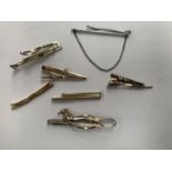 SEVEN ASSORTED TIE PINS