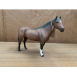 A BESWICK MATT BROWN 'QUARTER HORSE' CERAMIC MODEL