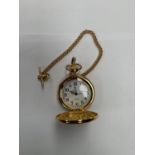 A GENTS MODERN POCKET WATCH AND CHAIN