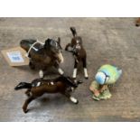 A COLLECTION OF FOUR BESWICK ANIMALS TO INCLUDE '992 BLUE TIT' AND THREE FURTHER HORSES