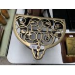 A VINTAGE TRIVET STAND