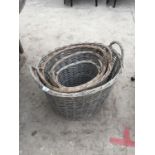 A LOT OF FOUR OVAL WICKER BASKETS