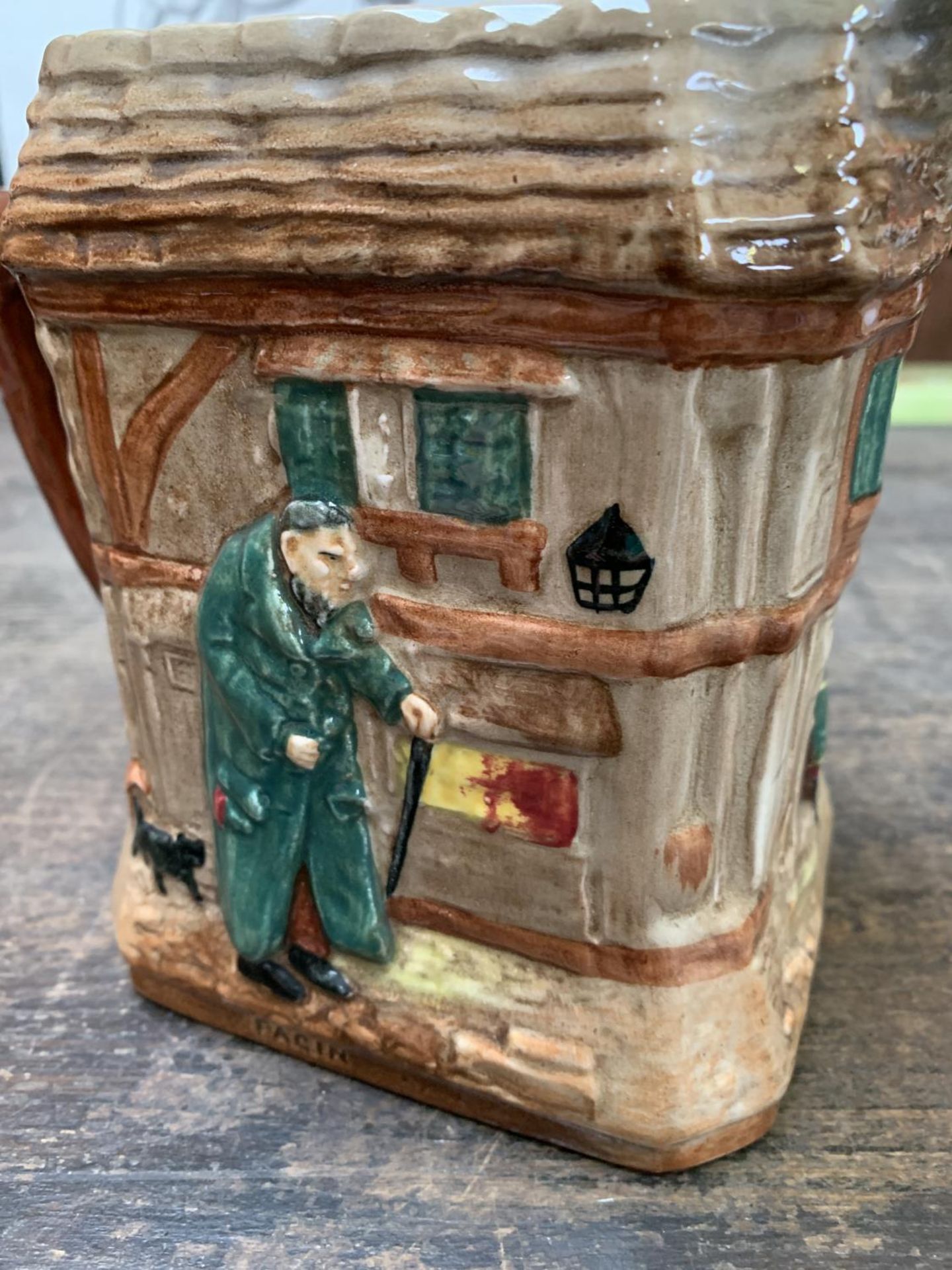 AN 'OLIVER TWIST' ROYAL DOULTON SERIES WARE JUG - Image 2 of 3