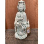 A CHINESE DEHAU PORCELAIN KWAN YIN GUANYIN SEST STATUE, 33CM