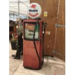 A VINTAGE PETROL PUMP FOR RESTORATION WITH DISPENSING PIPE/NOZZLE AND GLASS 'MOBIL PREMIUM' TOP