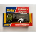 A 'DINKY' DIE CAST MODEL OF A REFUSE WAGON, BOXED