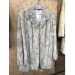 A VINTAGE LADIES LONG FUR COAT