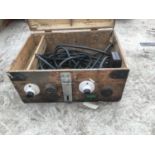 A WOODEN TOOL BOX WITH ELECTRICAL SOCKETS AND SWITCHES