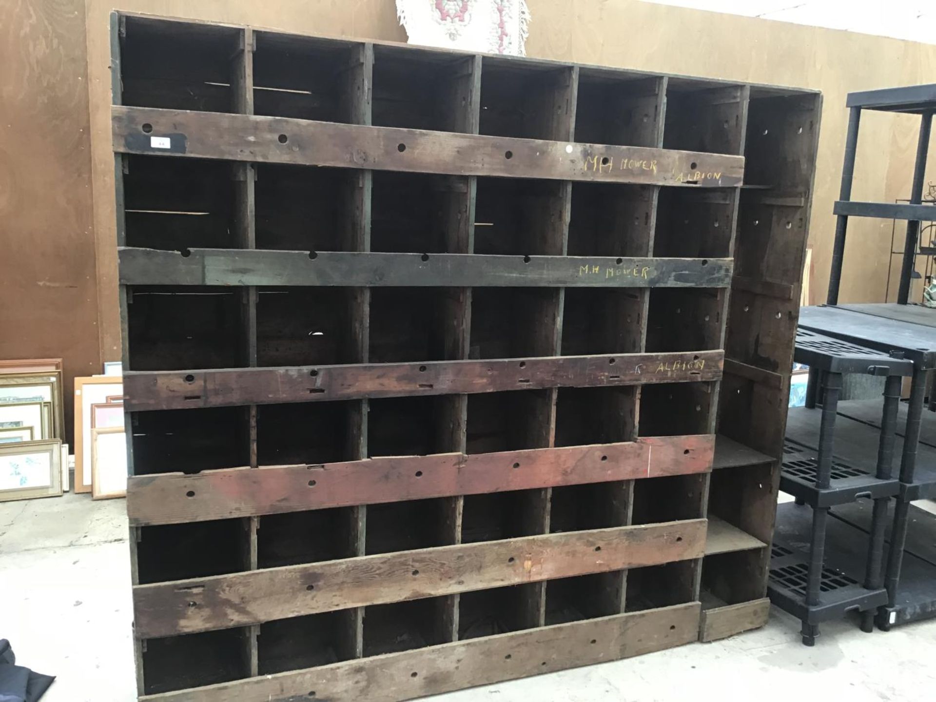 A LARGE VINTAGE PINE PIGEON HOLE CABINET