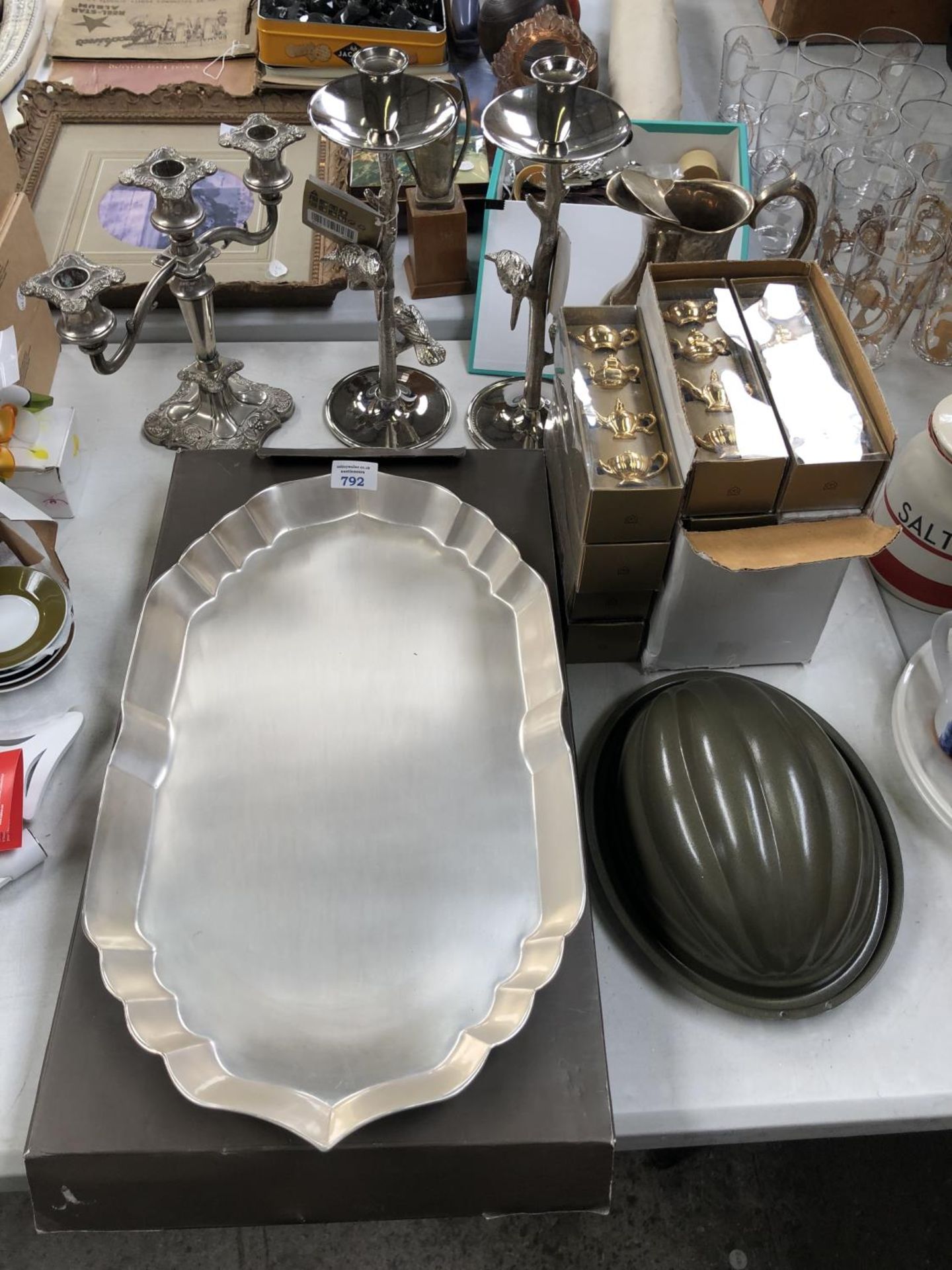 A MIXED GROUP OF ITEMS TO INCLUDE BOXED TEA POT , NAPKIN RINGS, CANDLE HOLDERS, TRAY ETC