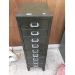 A VINTAGE NINE DRAWER METAL FILING CABINET