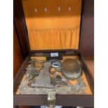 A BOX CONTAINING VARIOUS BRASS BADGES ETC