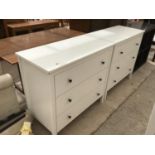 A PAIR OF MODERN WHITE CHESTS OF THREE DRAWERS