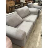 A TWO PIECE SUITE - TWO SEATER SOFA AND ARMCHAIR