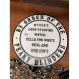 A CAST IRON PEAKY BLINDERS SIGN