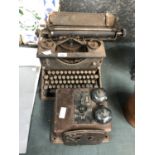 A VINTAGE METAL TYPE WRITER AND FURTHER ITEM (2)