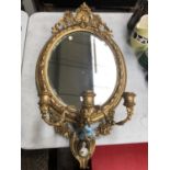 A 19TH CENTURY GILT FRAMED MIRROR WITH LOWER PORTRAIT PLAQUE AND THREE CANDLE BRANCH HOLDERS