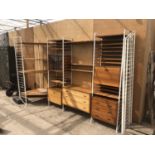 AN EXTENSIVE 'STAPLES' LADDERAX UNIT SET COMPLETE WITH TWO CHESTS OF DRAWERS, TWO FALL FRONT SETS,