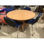 A CIRCULAR BOARDROOM TABLE AND FOUR BLUE FABRIC CHAIRS