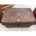 A VINTAGE METAL TRAVELLING TRUNK WITH BLUE INTERIOR