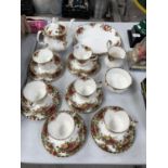 A TWENTY-TWO PIECE ROYAL ALBERT 'OLD COUNTRY ROSE' COMPLETE TEA SERVICE