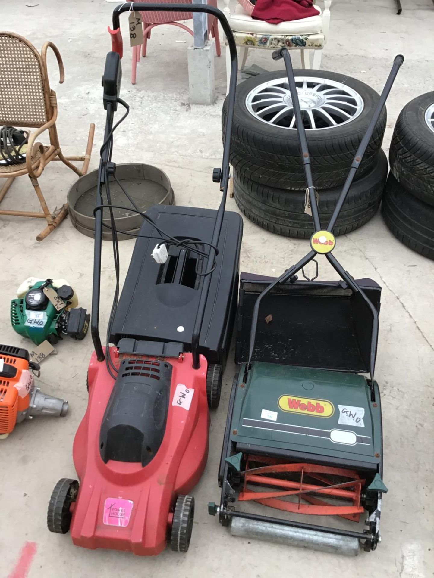 A WEBB PUSH MOWER WITH GRASS BOX AND A POWER HOUSE ELECTRIC MOWER BOTH IN WORKING ORDER