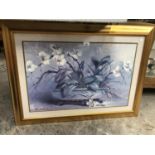 A LARGE GILT FRAMED FLORAL PRINT