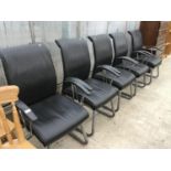 A SET OF FIVE BLACK LEATHERETTE WAITING ROOM ARMCHAIRS