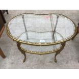 A DECORATIVE GILT AND GLASS COFFEE TABLE