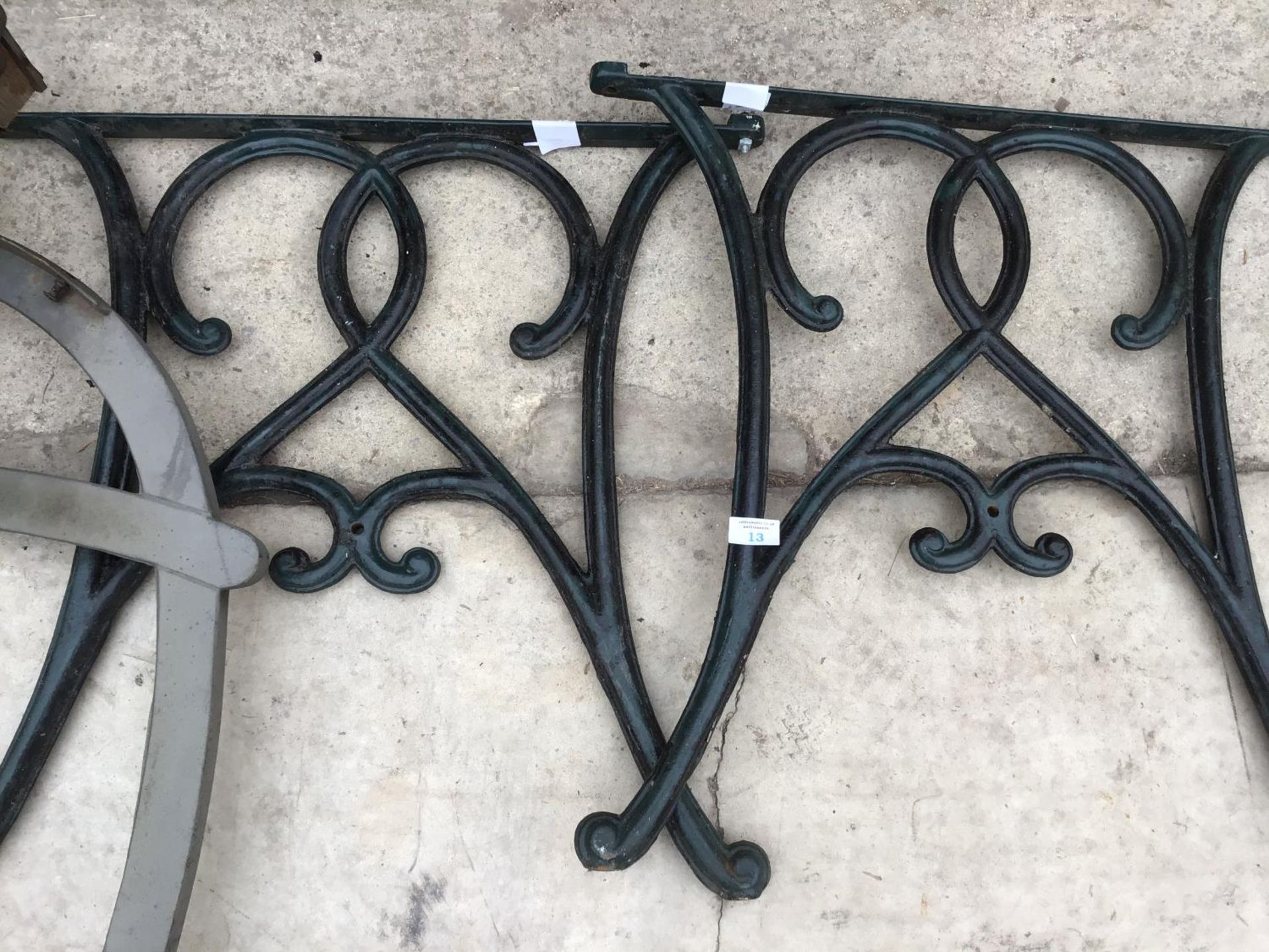 A PAIR OF CAST IRON BENCH ENDS AND A PAIR OF MODERN BENCH ENDS - Image 2 of 3