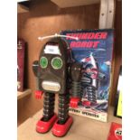 A VINTAGE BOXED 'THUNDER ROBOT' BATTERY OPERATED MODEL