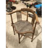 A MAHOGANY CORNER CHAIR