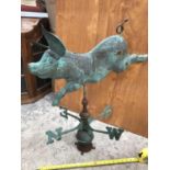 A VINTAGE COPPER WEATHER VANE OF A FLYING PIG