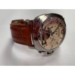 A GENTS FASHION WRIST WATCH WITH BROWN LEATHER STRAP