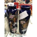 A PAIR OF ORIENTAL BLUE VASES