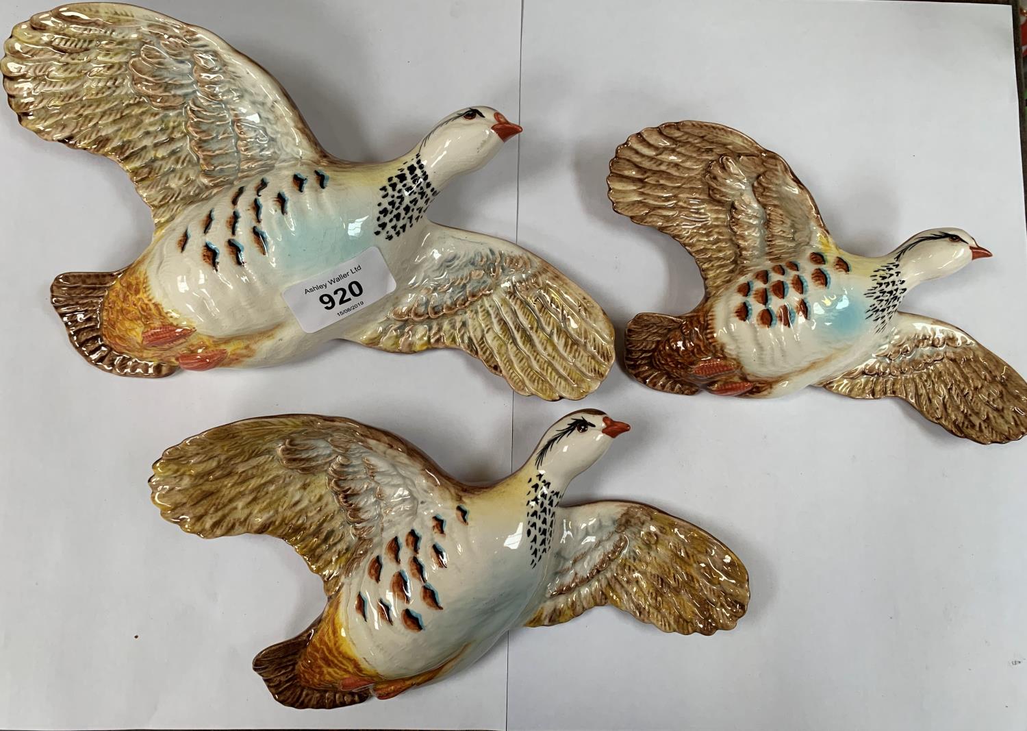 A SET OF THREE BESWICK 1188 PARTRIDGE BIRD WALL PLAQUES