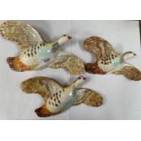 A SET OF THREE BESWICK 1188 PARTRIDGE BIRD WALL PLAQUES