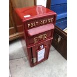 A RED POST OFFICE POST BOX WITH KEYS