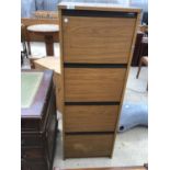 A FOUR DRAWER FILING CABINET