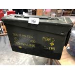 A 7.62MM VINTAGE METAL AMMO BOX