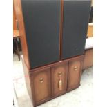 A MUSIC CABINET WITH SHARP MUSIC CENTRE AND SPEAKERS