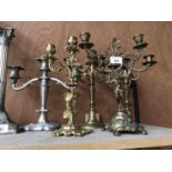 A GROUP OF FIVE CANDELABRAS
